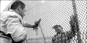 meeting_at_the_fence